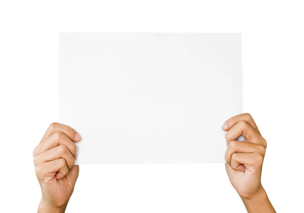 istock 2 Hands holding and rise up white paper for copy space and add text on white background. This photo is isolated and has clipping path. 1213877566