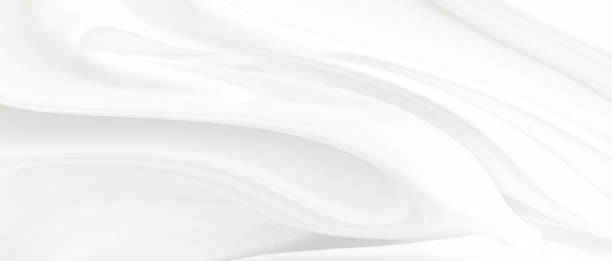 istock White gray satin texture that is white silver fabric silk panoramic background with beautiful soft blur pattern natural. 1213878461