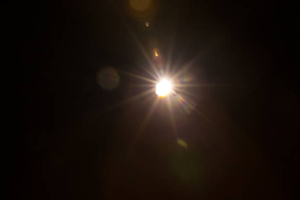 istock Abstract Natural Sun flare on the black 1213878676