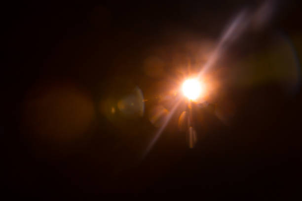 istock Abstract Natural Sun flare on the black 1213878802