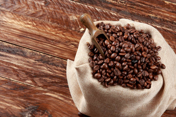 istock Fresh Roasted Coffee Beans in Linen Bag 1213879873