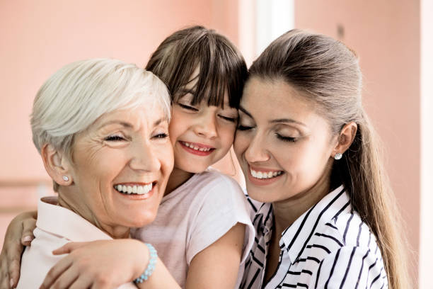 istock Loving Smiling family having fun hugging 1213880913