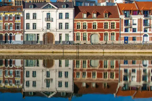 Houses reflected in water in Lille September 2019