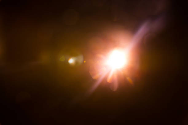 istock Abstract Natural Sun flare on the black 1213881730