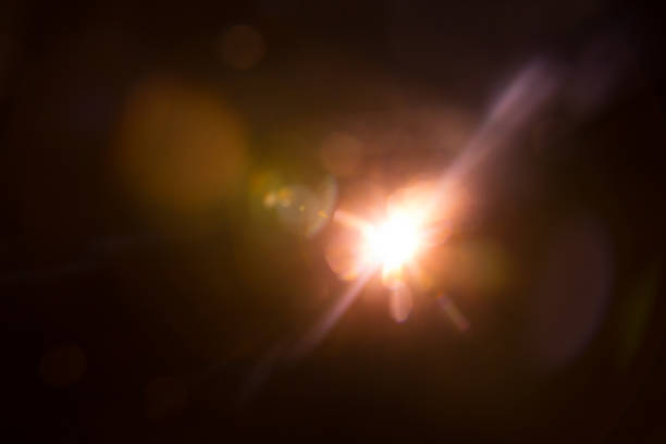 istock Abstract Natural Sun flare on the black 1213881787