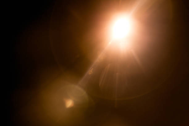 istock Abstract Natural Sun flare on the black 1213881900
