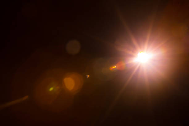 istock Abstract Natural Sun flare on the black 1213881960