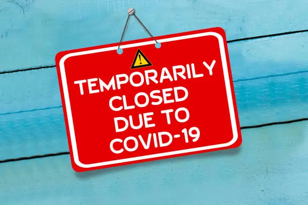Temporarily Closed Due to COVID-19 warning sign