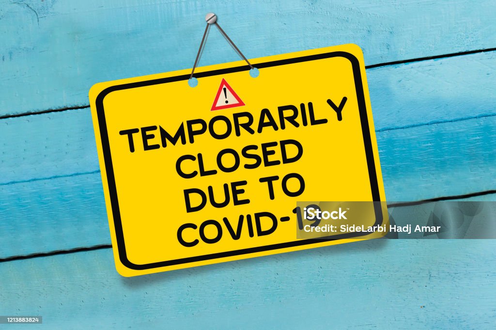 Temporarily Closed Due to COVID-19 warning sign Algeria Stock Photo