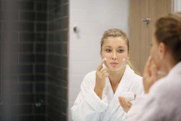 istock Magic anti-aging cream.Applying the cream 1213887077