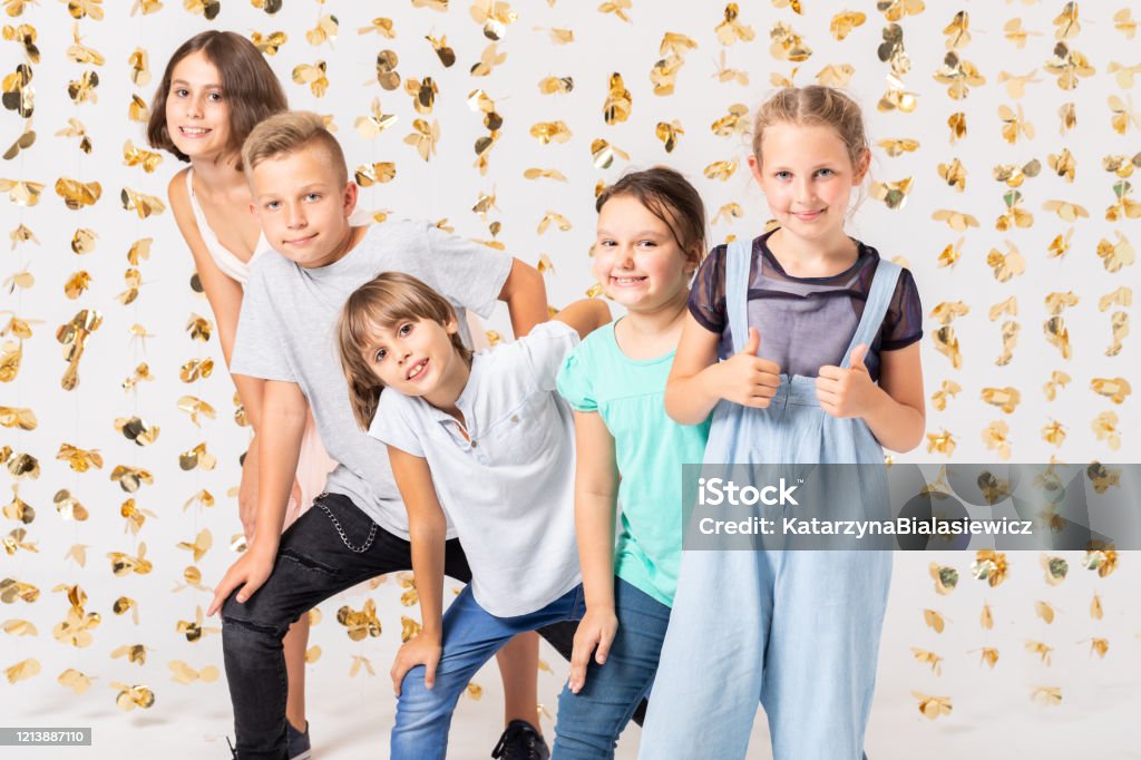 Group Of Cool Girls Fooling Around And Making Funny Poses During New Years  Party Stock Photo - Download Image Now - iStock