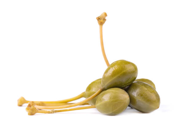 istock Capers isolated on white background. Pickled capers. Canned capers 1213888165