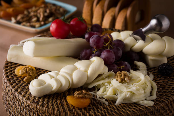 istock Cheese specialities on wooden table 1213889409