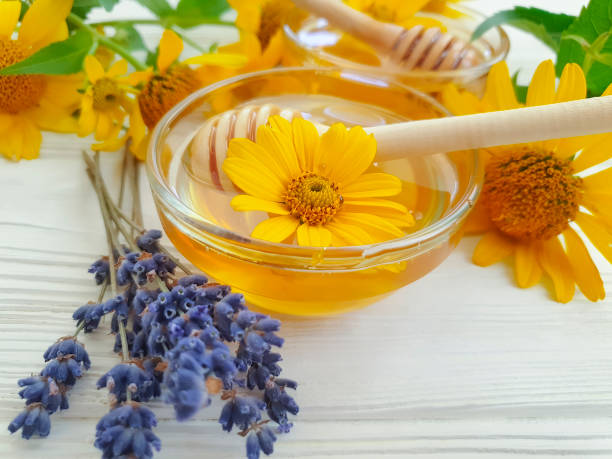 istock fresh honey calendula flower on wooden background 1213891743