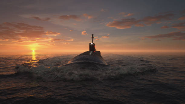 heavy atomic submarine in ocean at sunset - submarine navy underwater military ship imagens e fotografias de stock