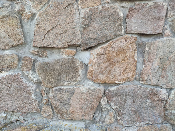 istock Background of large stones wall texture with different colors 1213893437
