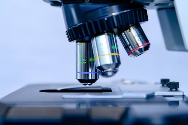 istock A close up light microscope for pharmaceutical bioscience research. Concept of science, laboratory and study of diseases. Coronavirus (COVID-19) treatment developing. 1213896507
