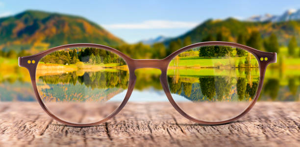 view through eyeglasses to nature - eyesight vision imagens e fotografias de stock
