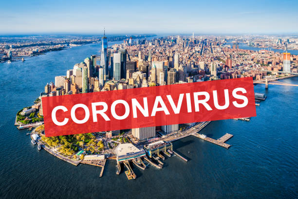 coronavirus covid-19 alert over Aerial view of Lower Manhattan. New York. USA coronavirus alert alert over Aerial view of Lower Manhattan. New York new york city built structure building exterior aerial view stock pictures, royalty-free photos & images