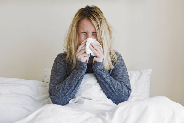 istock COVID-19 – Self-isolation - Sneeze 1213899534