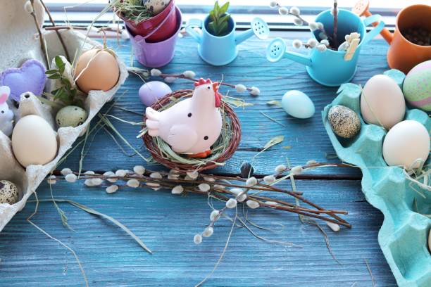 istock Easter toy chicken, eggs on a wooden windowsill, spring, festive home decor 1213900119