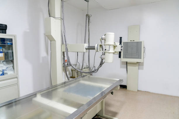 Empty x-ray room at a hospital - medical exam concepts