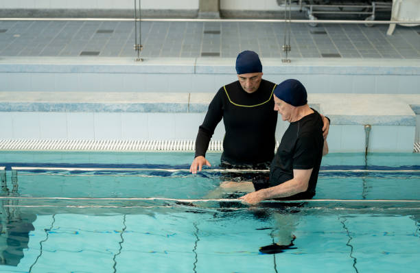 istock Senior man doing physical therapy in the water 1213902536