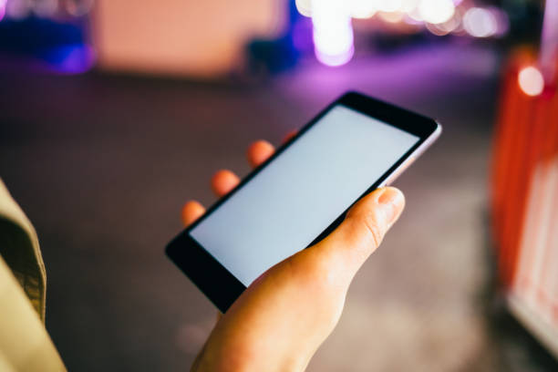 istock Female's hand holding mobile phone 1213906085
