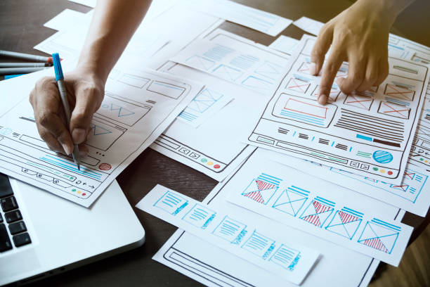 Website designer Creative planning application developer development draft sketch drawing template layout prototype framework wireframe design studio . User experience concept . diseñador de sitios web diseño de aplicaciones de planificación creativa desarrollo de desarrollo de proyecto de dibujo de boceto sin diseño de diseño de marco de diseño de estructura alámbrica estudio de diseño. concepto de experiencia de usuario.