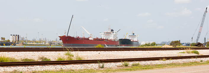 Oil Tanker at anchor, infront of oil refinery, Corpus Christi, Texas, USA