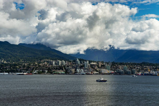 istock Beautiful cloudy summer day at the waterfront, Vancouver, BC, Canada 1213909100