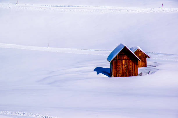 istock old hut in the snow three 1213910128