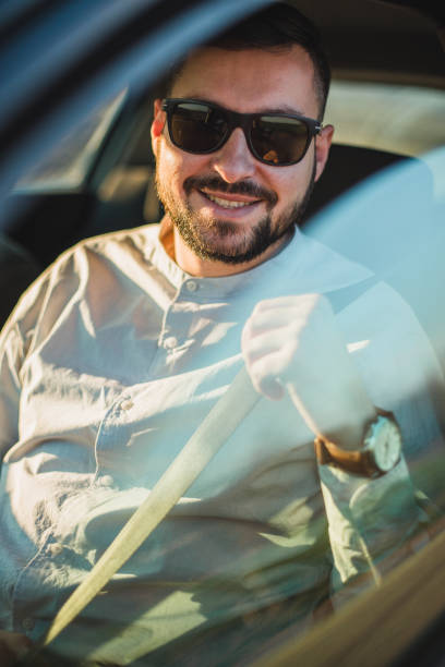 istock A man with sunglasses in the car 1213910358