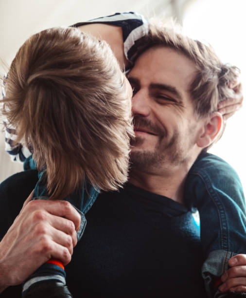 istock father and son have fun together 1213913478