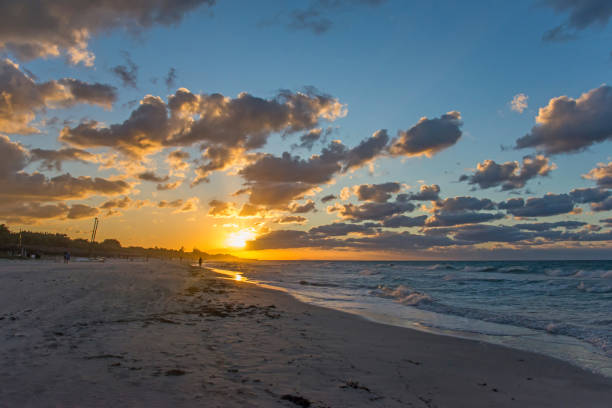 Sun sets over the horizon on the Atlantic ocean, Cuba