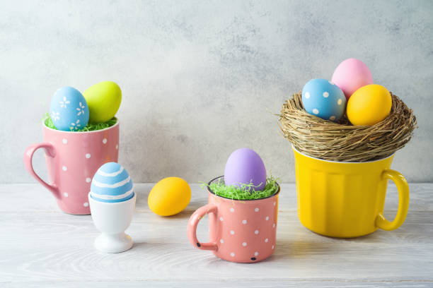istock Easter holiday decorations with easter eggs on wooden table 1213914058