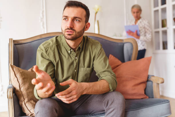 istock Sad male patient staring into the distance 1213917687
