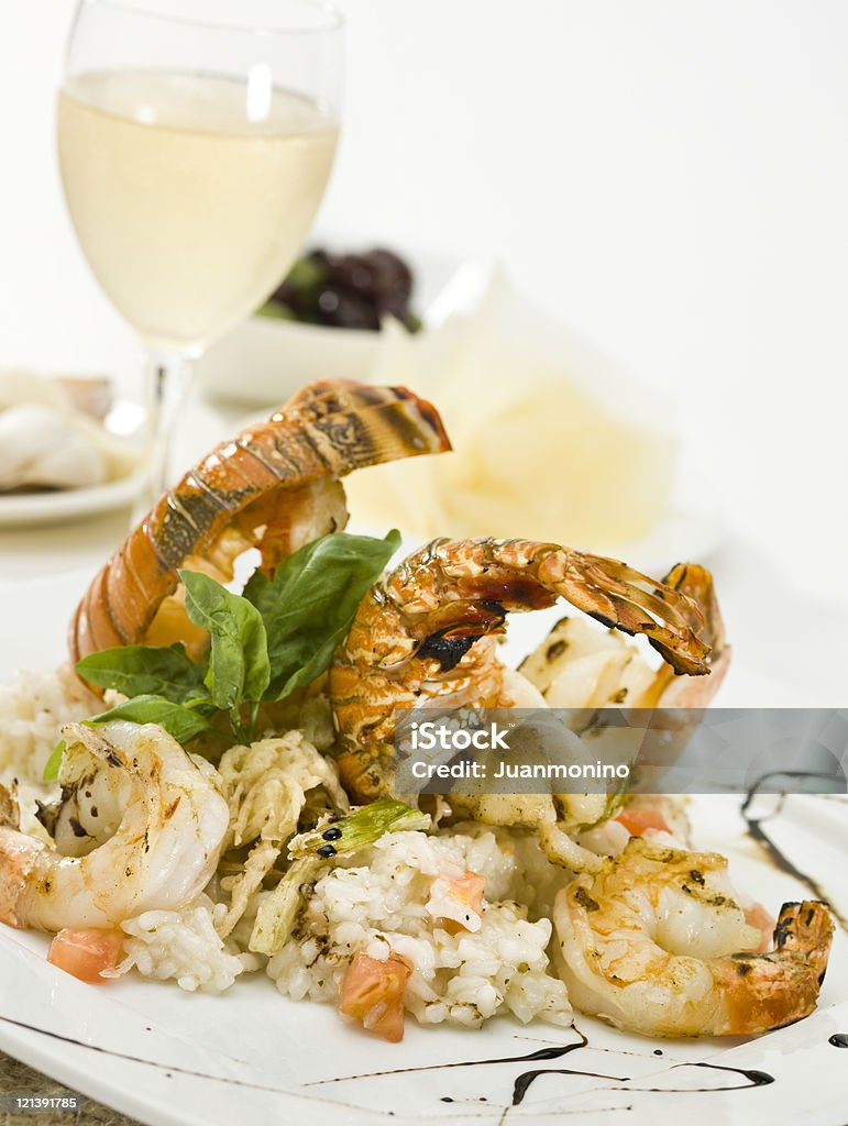 Grilled lobster and prawns risotto  Close-up Stock Photo