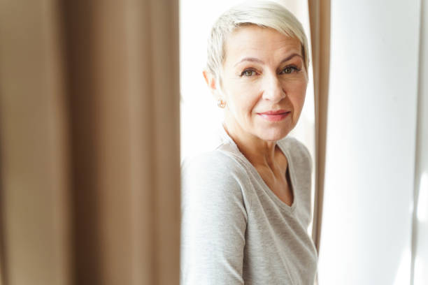 istock Pleasant woman looking in front of her 1213917965