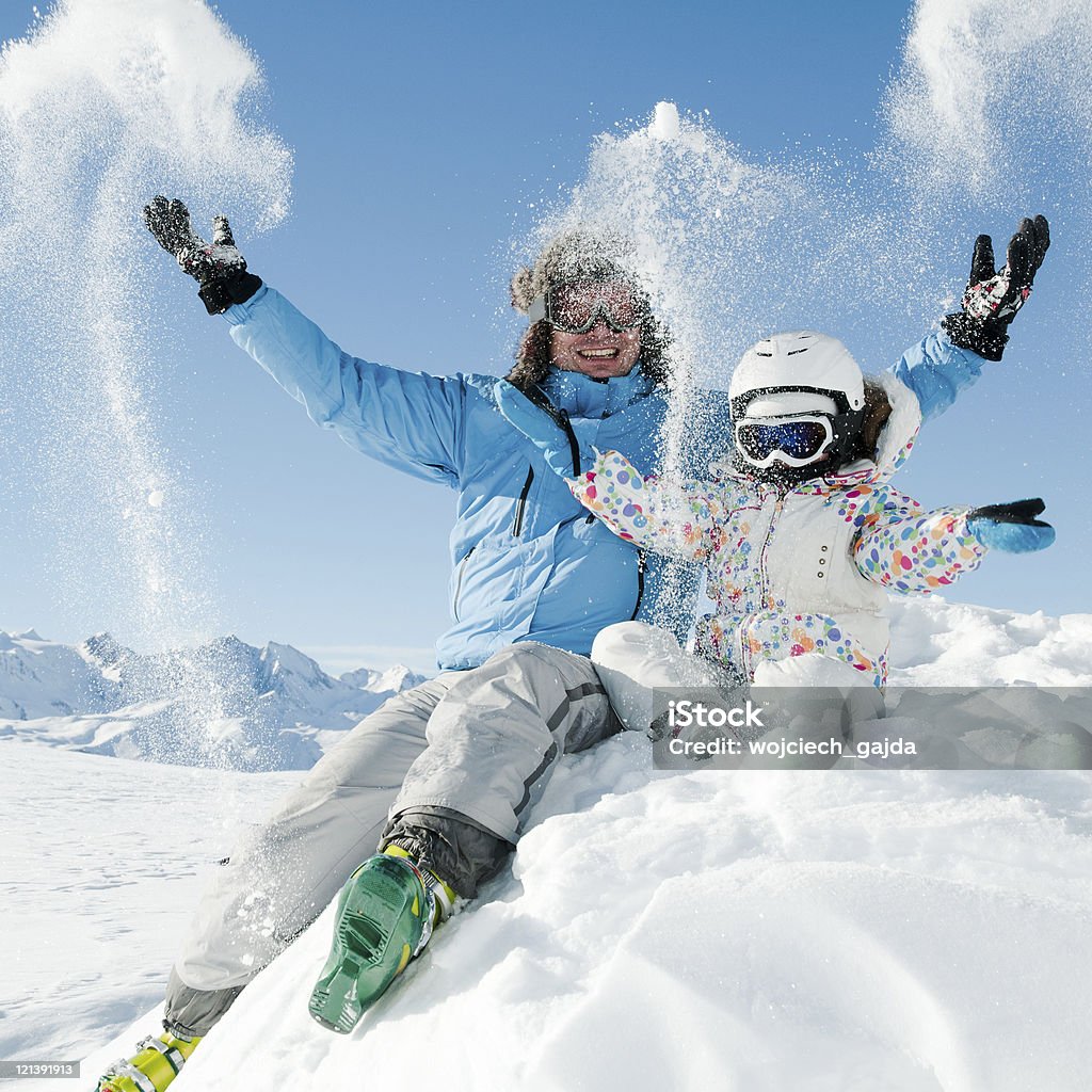 Snow, ski, sun and fun  Family Stock Photo