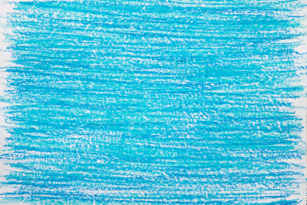 istock blue vax crayon on white paper background texture 1213920646