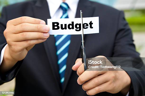 Business Cutting Budget Concept Stock Photo - Download Image Now - Cutting, Label, Scissors