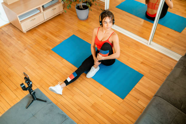 istock Attractive woman training at home 1213922504