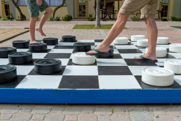 Playing With a Giant Checkers Set stock photo