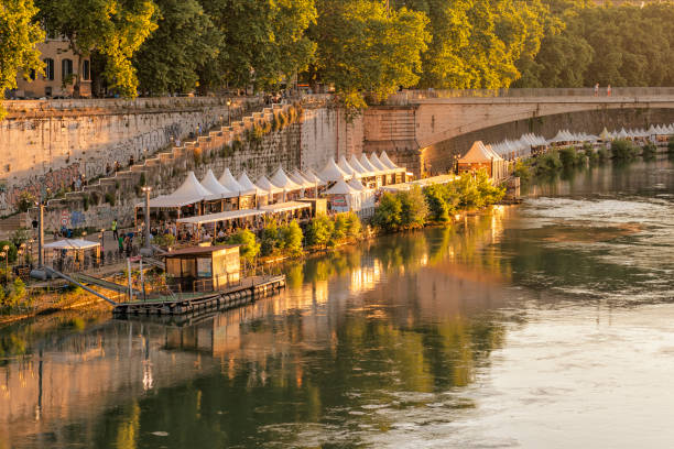 reflection of bridges in the river water. Rome. Italy.