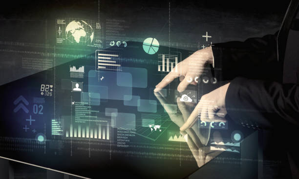 istock Businessman touching interactive modern desk with technology icons 1213926309