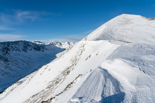 A breathtaking scenery of the snowy rocks at Dolomiten, Italian Alps in winter