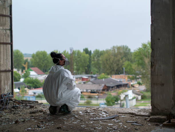 istock sad woman with mask in abandoned place 1213928864