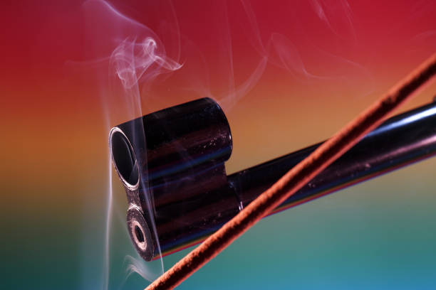 istock Gun with smoking barrel recorded in the studio 1213930969