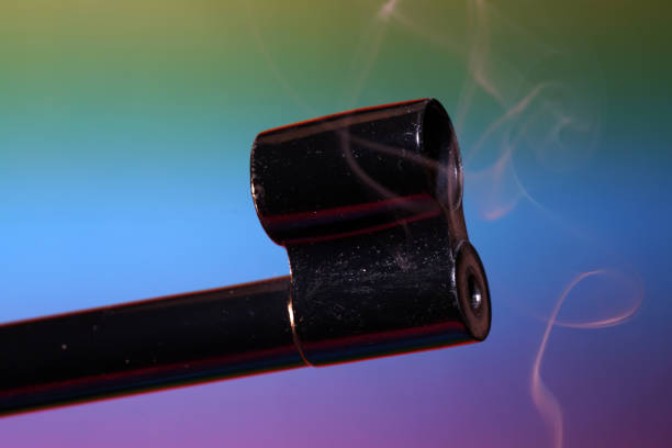 istock Gun with smoking barrel recorded in the studio 1213930994